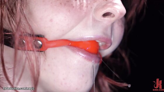 Gagged redhead shemale gets suspension