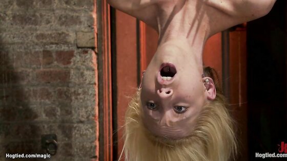 Slim blonde in upside down suspension