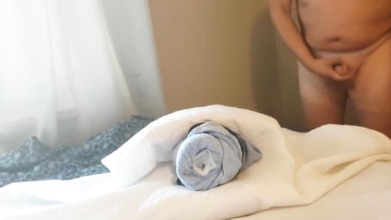 Boy cums nicely in towel