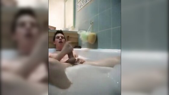 Twink jerking off in bathtub