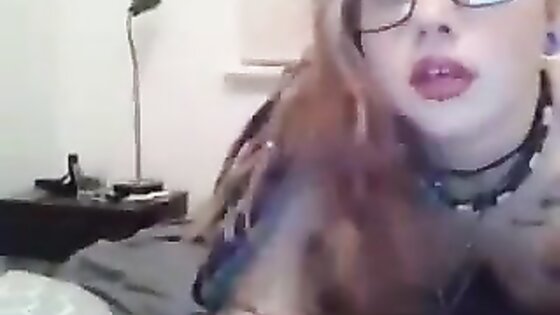 Naughty Chick with glasses masturbating and loving it